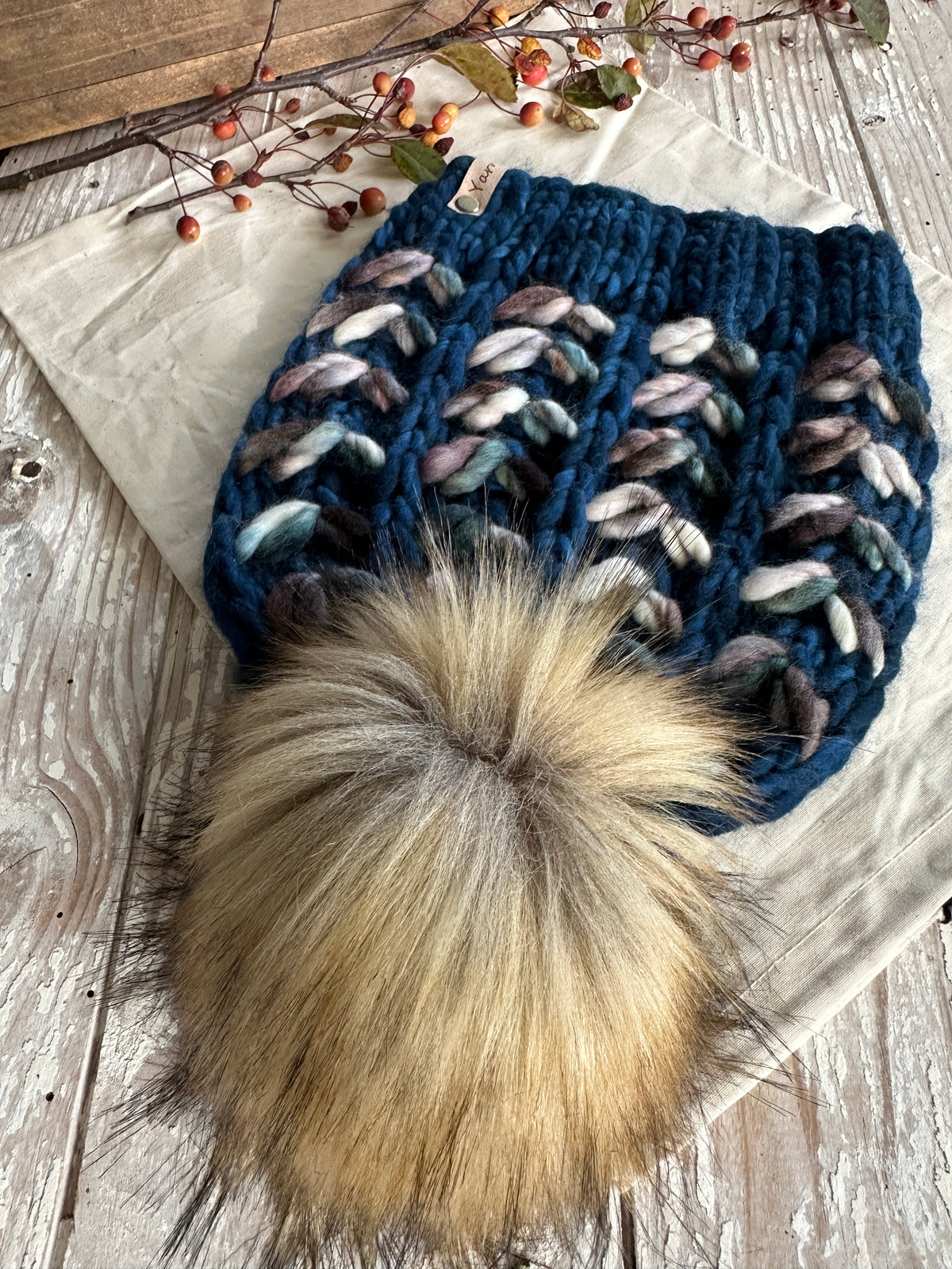 Merino wool knit hat with faux fur Pom