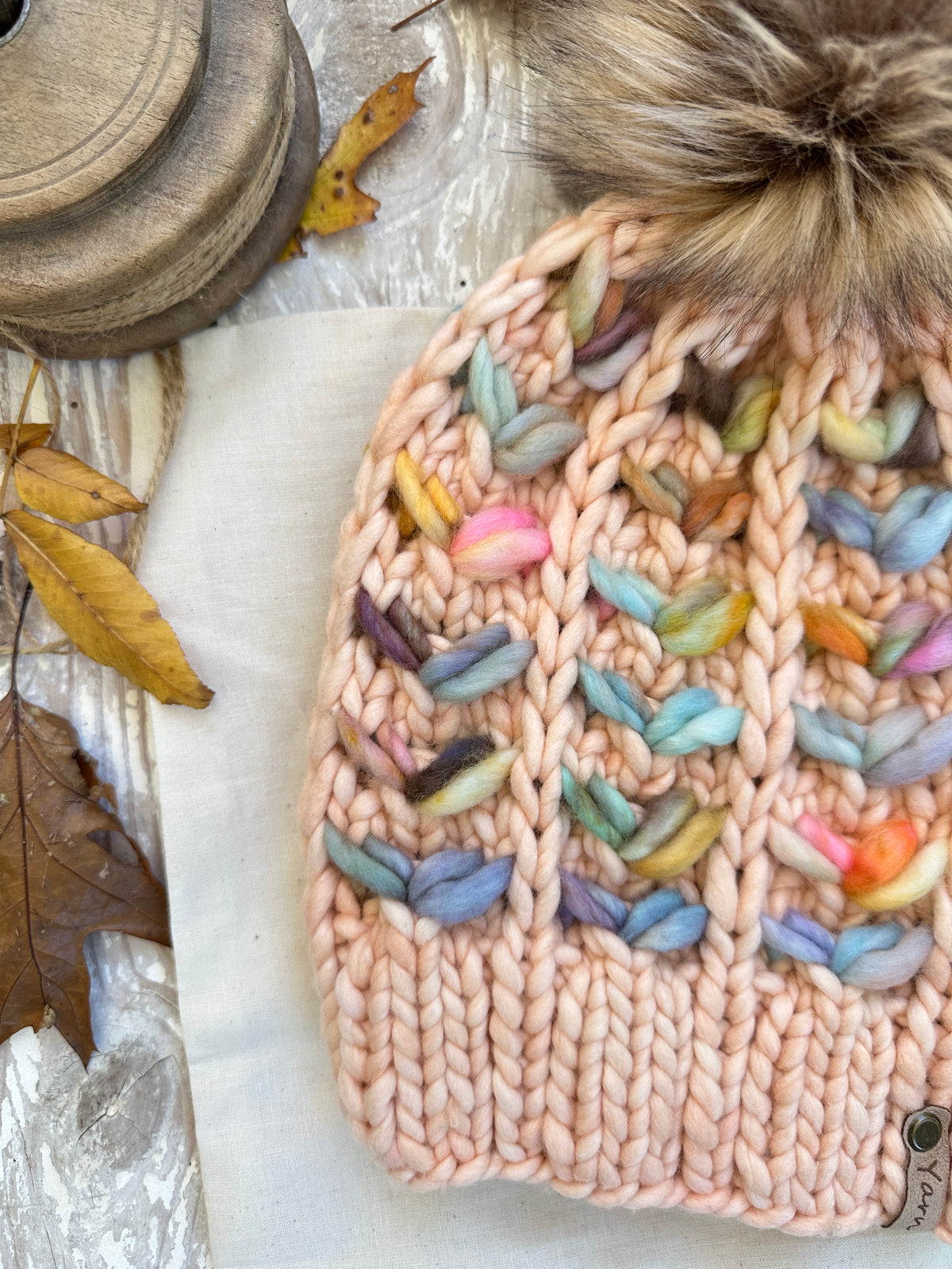 Merino wool knit hat with faux fur Pom