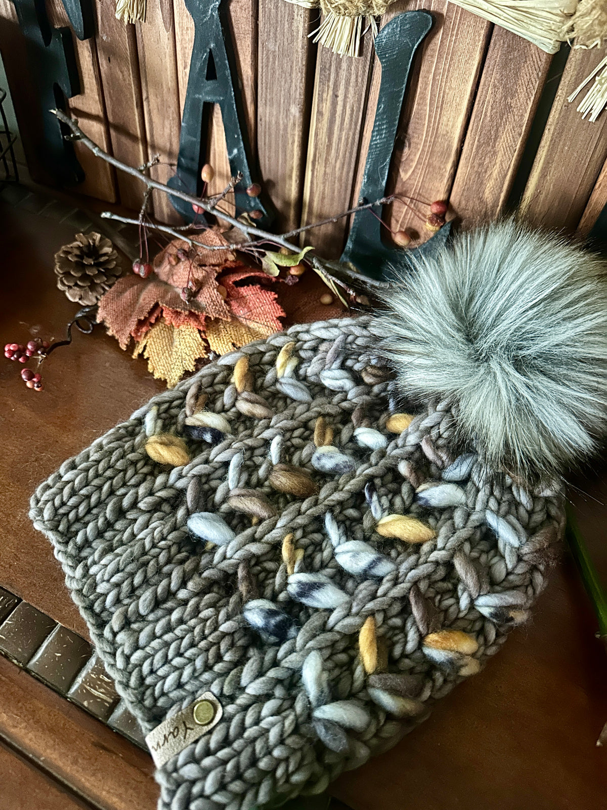 Merino wool knit hat with faux fur Pom