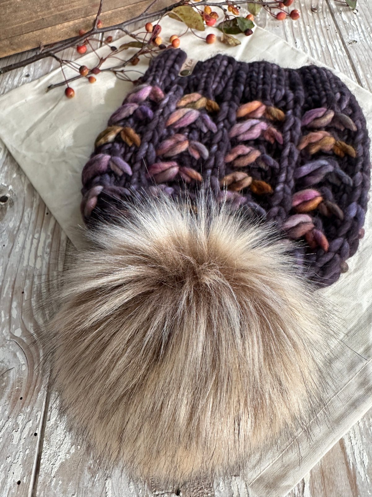 Merino wool knit hat with faux fur Pom