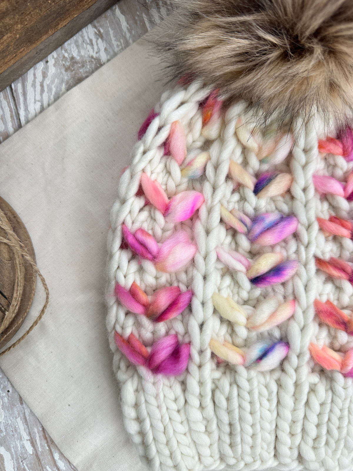 Merino wool knit hat with faux fur Pom